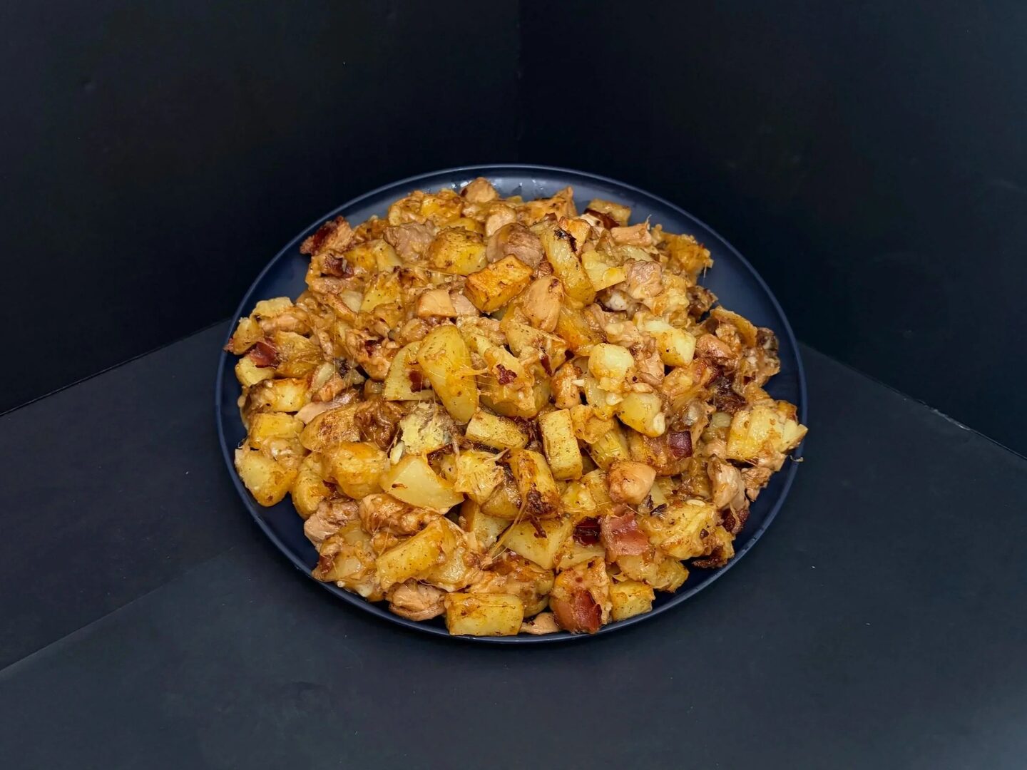Big A's Loaded Taters: golden diced potatoes mixed with chicken, bacon, and cheese.